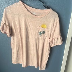 peach color, short sleeve, Sun and pom trees on pocket